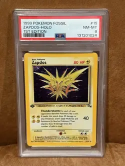 1999 POKEMON FOSSIL 1ST EDITION #15 ZAPDOS - HOLO PSA 8 - Image 1