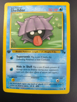 Shellder Pokemon Card 54/62, 1st Edition Base Set Fossil, WOTC 1999, Excellent - Image 1