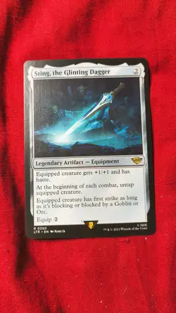 MTG Sting, the Glinting Dagger - Universes Beyond: The Lord of the Rings - Image 1