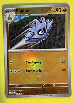Pupitar (Master Ball Pattern) 048/131 Pokemon TCG Prismatic Evolutions Holo Card - Image 1