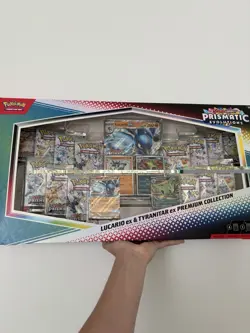Pokemon TCG Prismatic Evolutions Lucario Ex + Tyranitar Ex Premium Collection - Image 1
