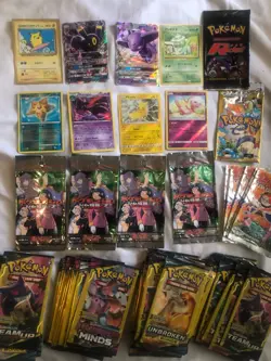 BIG DEAL POKEMON CARD LOT EMPTY VINTAGE AND TEAM UP BOOSTER PACKS AND MORE - Image 1
