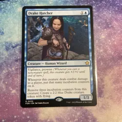 Drake Hatcher (REGULAR) x1 - MTG Foundations FDN #35 - Image 1