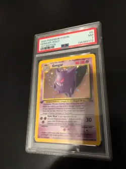 1999 Pokemon TCG Fossil 1st Edition Gengar Holo Rare Card 5/62 PSA 7 - Image 1