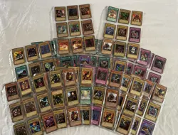 YuGioh LOT BUNDLE COLLECTION BINDER SLEEVES OF 142 CARDS - Image 1