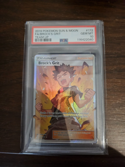 2019 POKEMON SUN & MOON TEAM UP 172/181 FULL ART/BROCK'S GRIT PSA 10 - Image 1