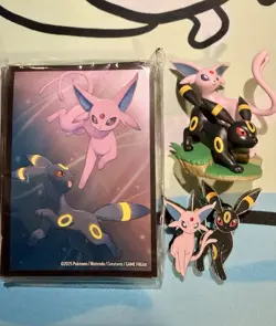 Prismatic Premium Figure Collection Sleeves, Figure, and Pin - Umbreon & Espeon - Image 1