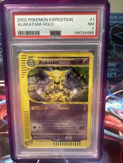 2002 POKEMON EXPEDITION #1 ALAKAZAM-HOLO PSA 7 - Image 1