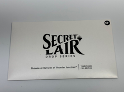 MTG Secret Lair Showcase: Outlaws of Thunder Junction Foil Edition SEALED - Image 1