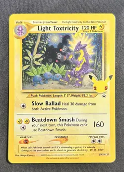 Light Toxtricity SWSH137 Celebrations Promo Card Holo NM - Image 1