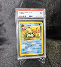 1999 Pokemon Fossil 1st Edition Omanyte #52 PSA 7 - Image 1