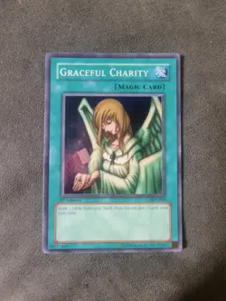 Yu-Gi-Oh! TCG Graceful Charity Super Rare 1st Edition SDP-040 NM MINT - Image 1