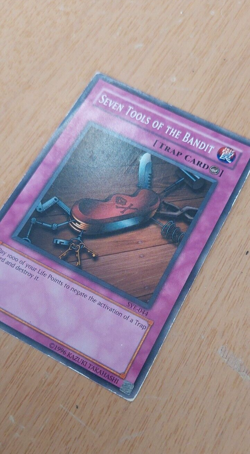 Seven Tools of the Bandit SYE-044 YuGiOh card (LP) - Image 1