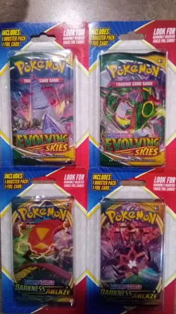 POKEMON CARDS - LOT OF 4 PACKS; EACH INCLUDES 1 FOIL CARD- RARE ONLY SOLD AT CVS - Image 1