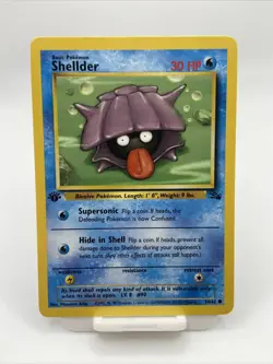 Shellder 1st Edition 54/62 Fossil Common Pokemon Vintage Card WOTC NM 1999 - Image 1
