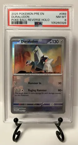 2025 Pokemon Prismatic Evolutions Duraludon 69 Poke Ball Reverse Holo PSA NMT 8 - Image 1