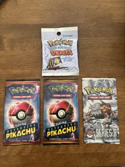 Lot of 4 Pokemon Packs Detective Pikachu, Pop Series 8, 1997 Series 1 Stickers - Image 1