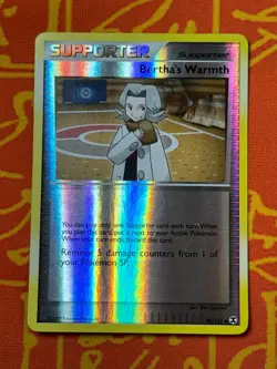 POKEMON TCG BERTHA'S WARMTH 90/111 REVERSE HOLO RARE MODERATE PLAY RISING RIVALS - Image 1