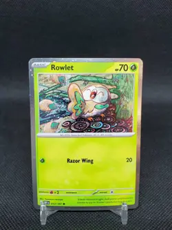 Rowlet 013/197 Cosmos Holo NM Pokemon Card - Image 1