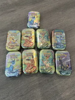 Lot Of 9 - Pokemon TCG Scarlet & Violet - Prismatic Evolutions Mini Tins Sealed - Image 1