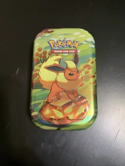 Pokemon TCG Scarlet & Violet Prismatic Evolutions Mini Tin Sealed (Flareon) - Image 1
