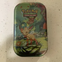 Pokemon TCG Scarlet & Violet Prismatic Evolutions Mini Tin Sealed [Leafeon] New - Image 1