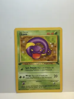 1st Edition Ekans 46/62 Fossil Non Holo Common WoTC Pokemon 1999 LP - Image 1