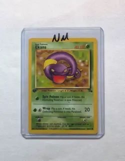 💎NM 1st First Edition Ekans #46/64 Fossil Set Pokemon Card 1999 WOTC TCG PSA - Image 1