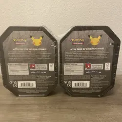 Two (2) New and Sealed Pokemon 25th Celebrations Lance's Charizard V Tin - Image 3