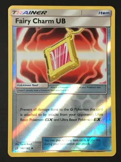 Pokemon TCG Fairy Charm UB 142/181 Sm-Team Up Reverse Holo NM - Image 1