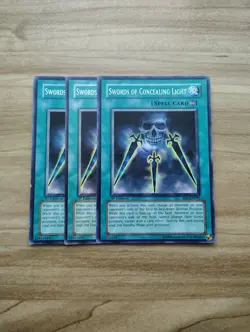 Yu-Gi-Oh! - Swords Of Concealing Light 3X - Full Playset - Image 1