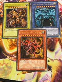 Gotterkarten 3er Set Gotter YGLD Slifer Obelisk RA Ultra Rare Englisch NM YUGIOH - Image 1