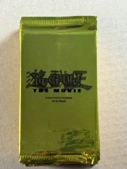 28 factory-sealed Yu-Gi-Oh! The Movie gold promo packs from 2004 - Image 2