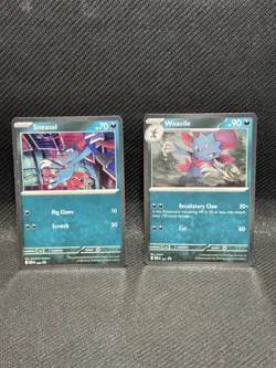 Sneasel 20 and Weavile 21 Cosmos Holo Promos from Phantasmal Flames Pokemon TCG - Image 1