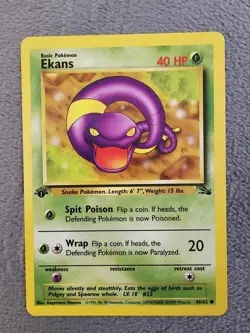 Ekans 1st Edition Fossil 46/62 LP 1999 Vintage WOTC Pokemon Card - Image 1