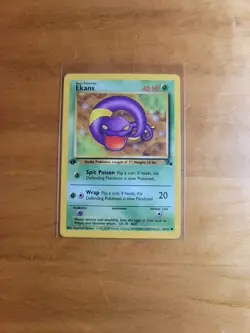 Ekans 46/62 Fossil 1st Edtion 1999 Common Vintage Pokemon TCG Card NM - Image 1