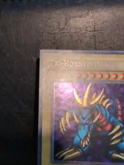 Yu-Gi-Oh! SECRET RARE HOLO TRI-HORNED DRAGON LOB-000 1996 VINTAGE PRINT LP - Image 5