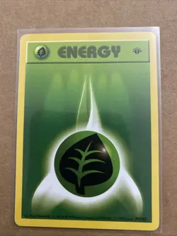 Pokemon TCG Grass Energy Base Set 99/102 1st Edition Never Played Near Mint - Image 1