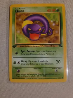 Ekans 46/62 1999 Pokemon Fossil 1st Edition Common Card NM Condition - Image 1