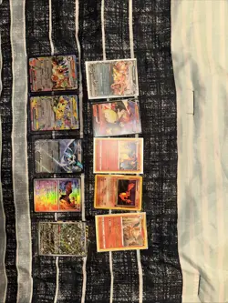 Pokemon Lot Of 10 Nm Cards Including 4 Charizards And A Team Rockets charmander - Image 1