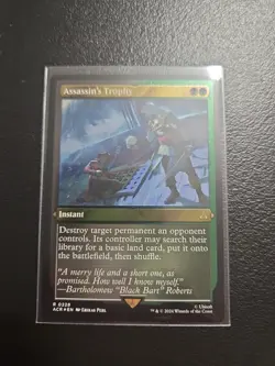 Assassin's Trophy (Foil Etched) Universes Beyond: Assassin's Creed Foil - Image 1