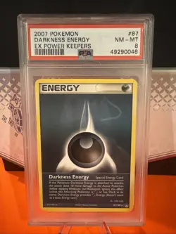 Darkness Energy #87 Pokemon Power Keepers PSA 8 - Image 1