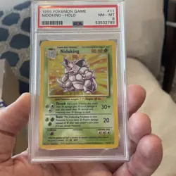 1999 POKEMON GAME #11 NIDOKING-HOLO PSA 8 - Image 1