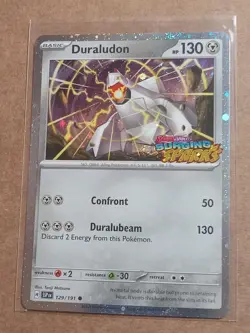 POKEMON SURGING SPARKS STAMPED DURALUDON 130/191 SV08 COSMOS HOLO - Image 1