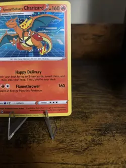 Pokemon TCG Special Delivery Charizard Black Star Promo Card SWSH075 LP - Image 4