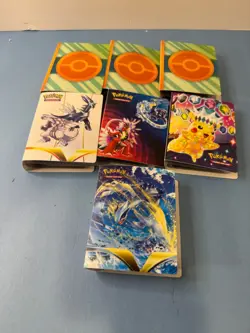 Pokemon TCG Mini Portfolio Lot of 7 Full Of Cards - Image 1