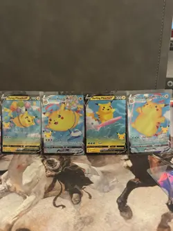 Flying / Surfing Pikachu V & VMAX Celebrations Pokemon 4 Card Set - Image 1