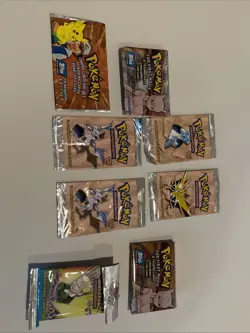 Vintage Pokemon Lot - 2 Sealed Topps First Movie Packs + Empty WotC Boosters - Image 1