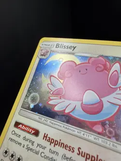Pokemon TCG SM Lost Thunder Blissey 153/214 Cosmos Holo Promo SWIRL Small Dent - Image 2