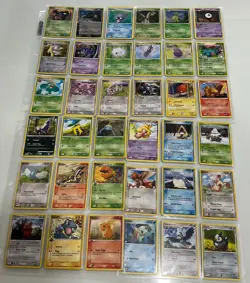 Huge Pokemon lot, binders, pogs, toys, 451 cards. Sealed Blockbuster binder - Image 1